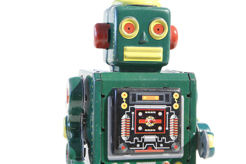 Close up of Little Green Vintage robot tin toy   