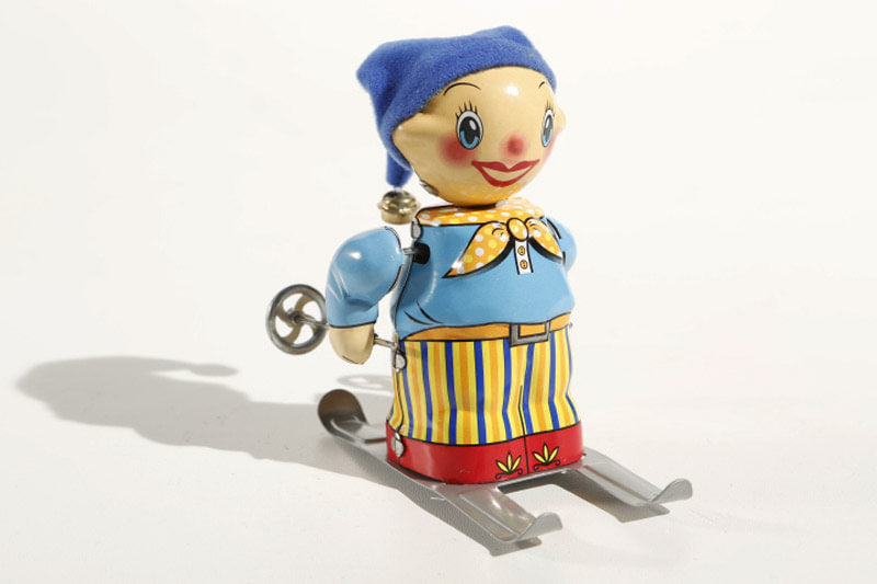 Little Skier tin toy
