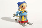 Little Skier tin toy
