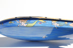 Close up of Mermaid Pop Pop Candle Boat Retro Tin Toy