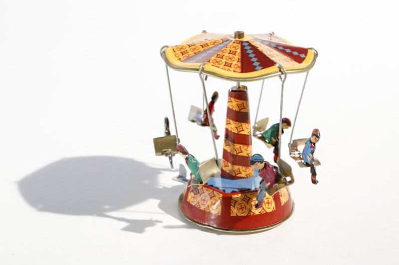 Mini Roof carousel tin toy