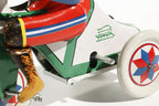 Close up of monkey of tricycle tin toy 