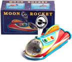 Colourful tin toy moon rocket with packaging i