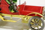 Ol Timer vintage car tin toy with red body and yellow chassis
