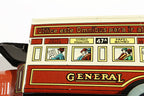 Close up of omnibus tin toy with passengers