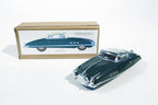 Close up of packard tin toy car with packaging