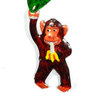 Close up of monkey from Palm Tree Monkey Carousel Tin Toy
