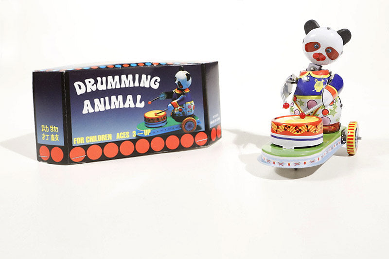 colourful panda cart tin toy with its packaging