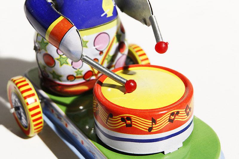 Close up of colourful panda cart tin toy
