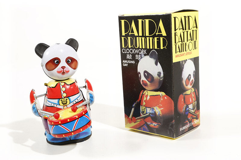 colourful panda drummer tin toy with its packaging