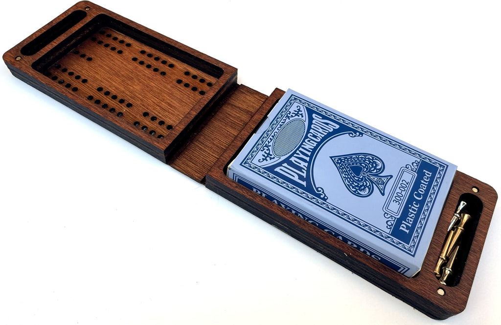 Leather and Mahogany travel cribbage set supplied with playing cards and metal pegs