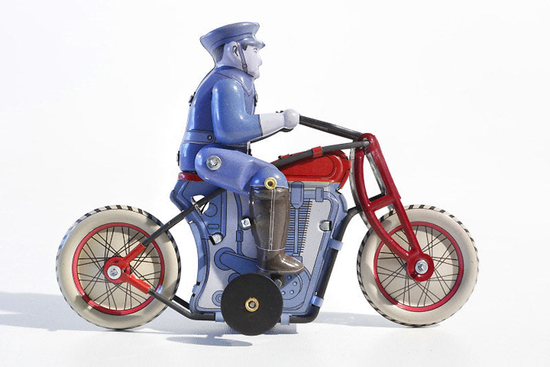 Policeman on Bike tin toy
