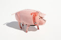Polly the Pig Tin Toy with red and white scarf