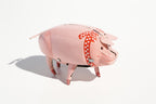Polly the Pig Tin Toy with red and white scarf