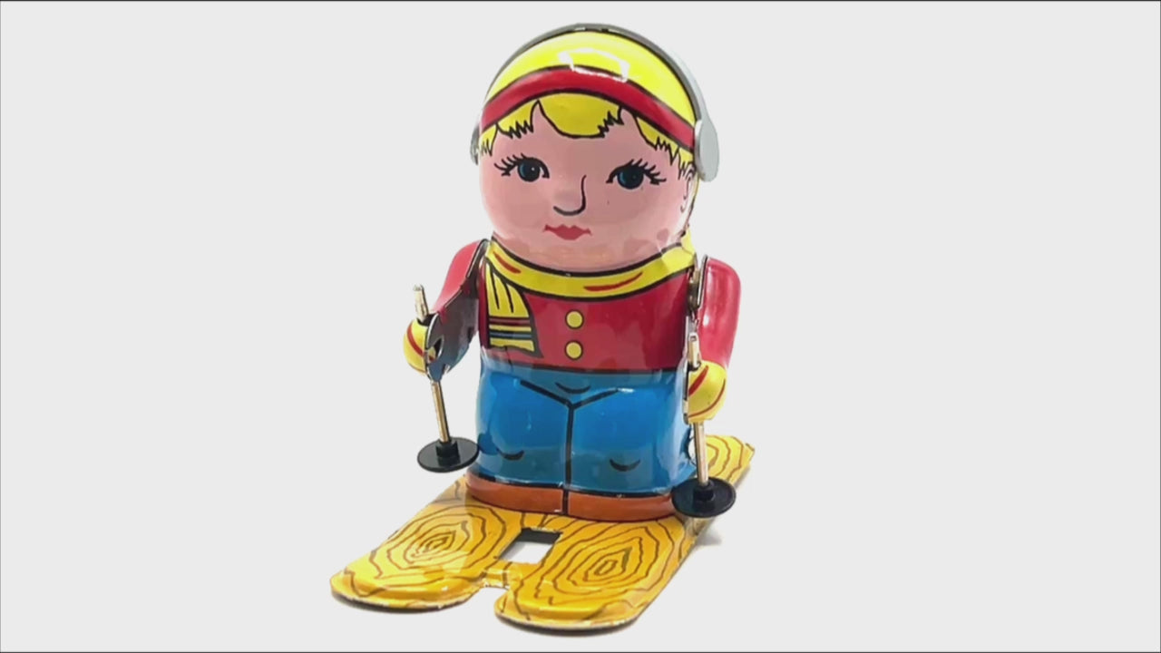 Small Girl on Ski's clockwork toy - Collectable Tin Toy