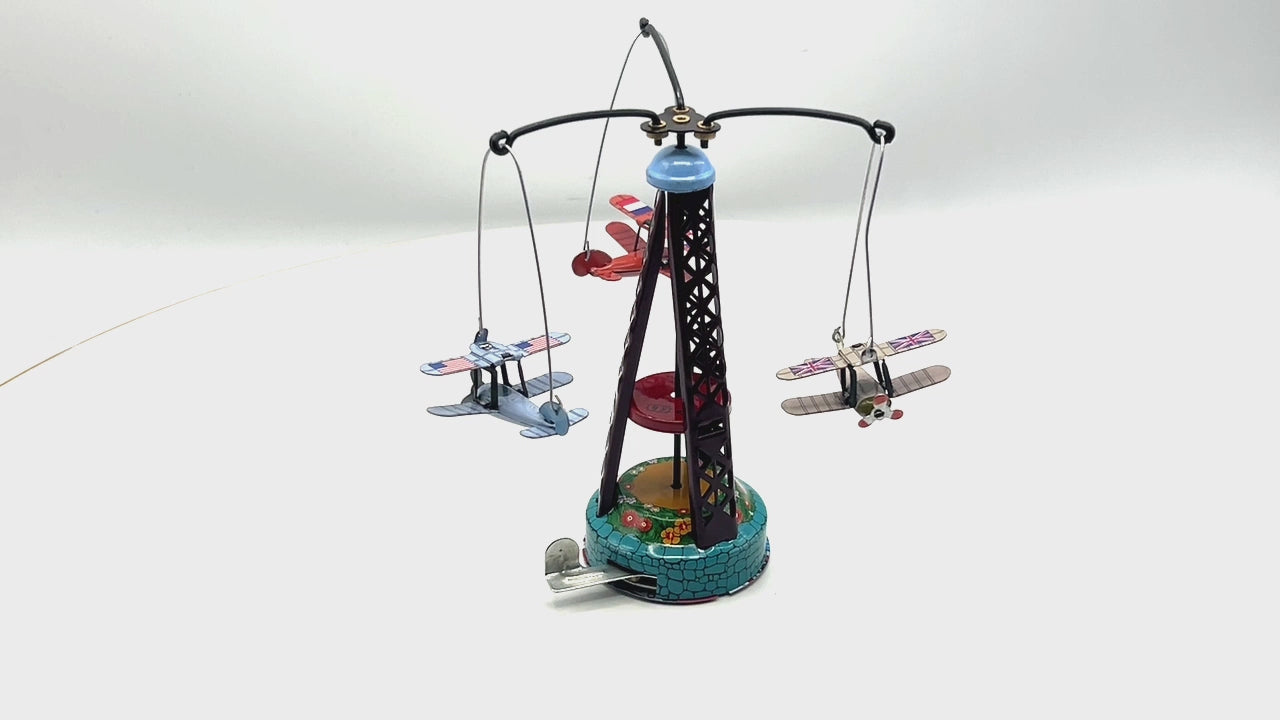 Bi plane carousel fairground tin toy
