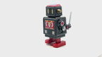 Black Robot with sword - Collectable Tin Toy