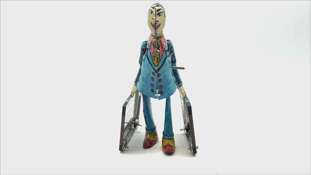 Paya imitation Student with suitcase clockwork toy - Collectable Tin Toy