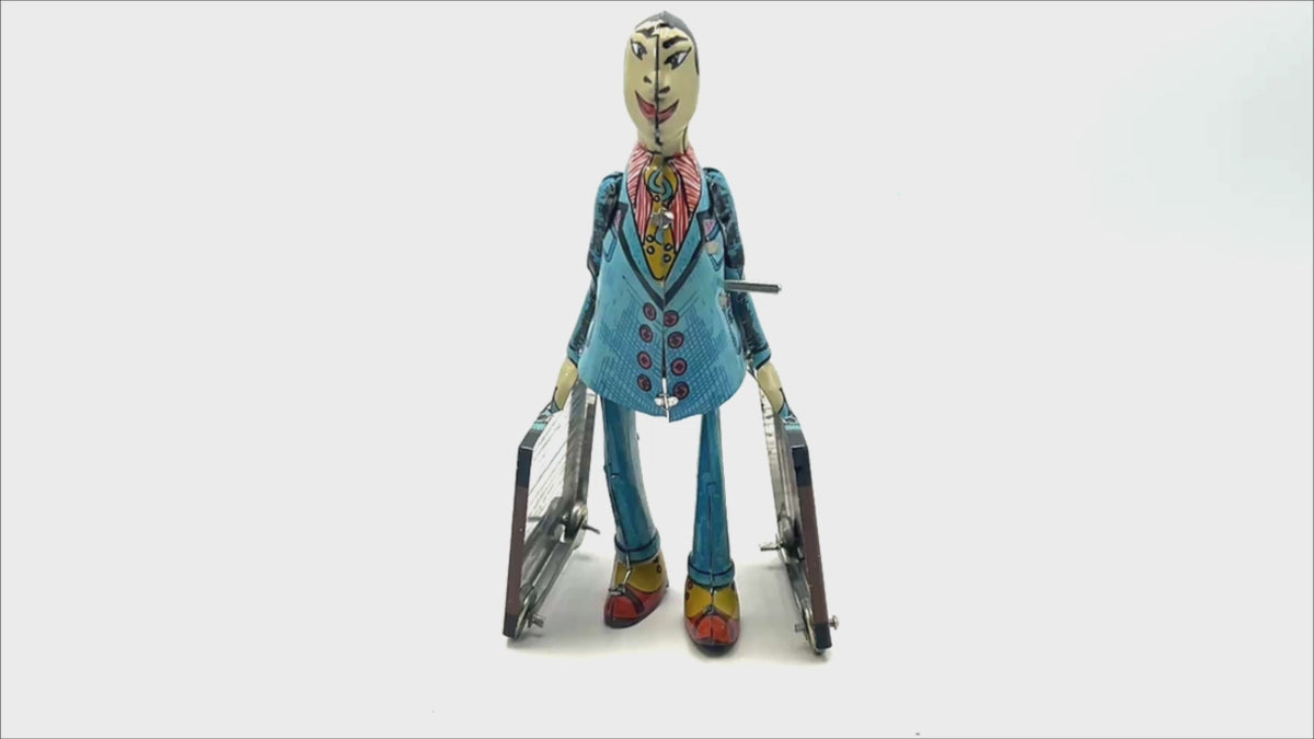 Paya imitation Student with suitcase clockwork toy - Collectable Tin Toy