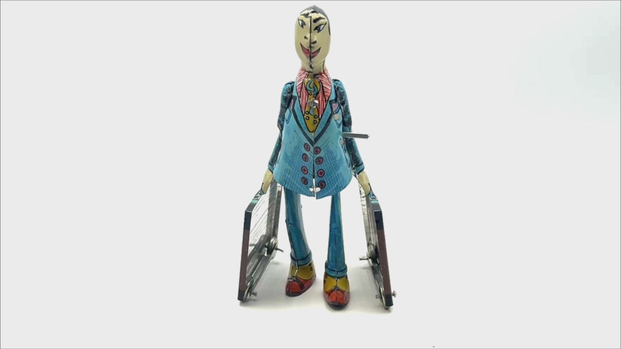 Paya imitation Student with suitcase clockwork toy - Collectable Tin Toy