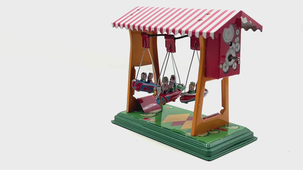 Small Swing Boats fairground tin toy