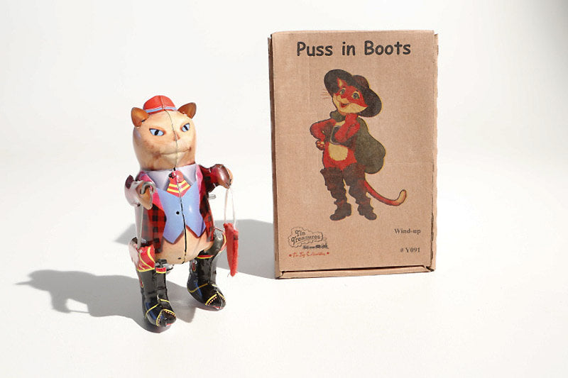 Puss in boots tin toy with its packaging