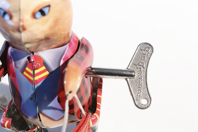Close up of Puss in boots tin toy with wind up key