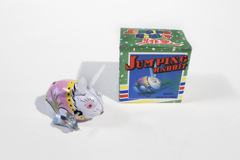 Toy toy rabbit with packaging labelled 'Jumping Rabbit' 