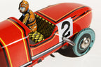 Cloe up of red race car number 2 tin toy car