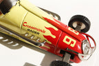 Close up of Champion racer car 98 Tin Toy
