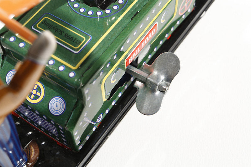 Close up of Schylling Rail Road Hand Car tin toy
