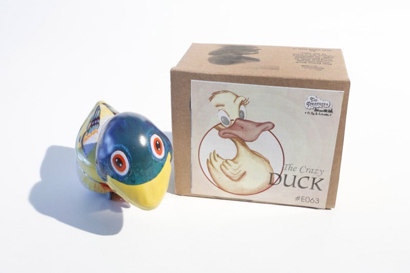 Crazy Duck Tin Toy with its packaging