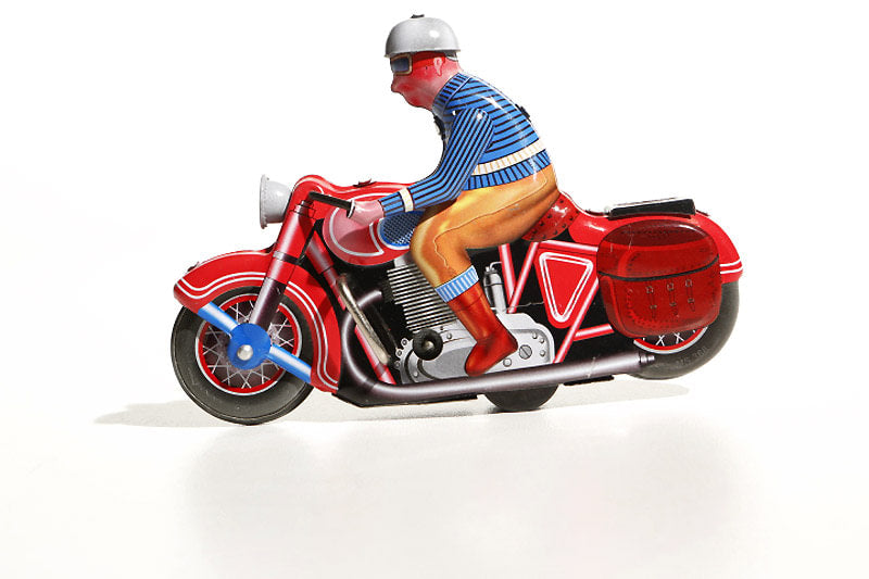 Red motorcycle tin toy
