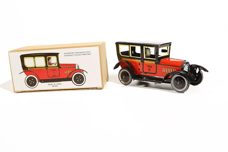 Red Taxi Tin Toy with packaging