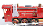 Close up of Red Wind-Up Locomotive tin toy