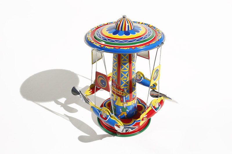 Colourful Rocket Ride Carousel Tin Toy