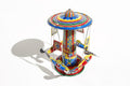 Colourful Rocket Ride Carousel Tin Toy
