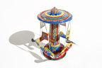 Colourful Rocket Ride Carousel Tin Toy