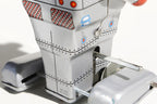 Close-up of  Rosie Tin Toy Vintage-style tin toy robot 