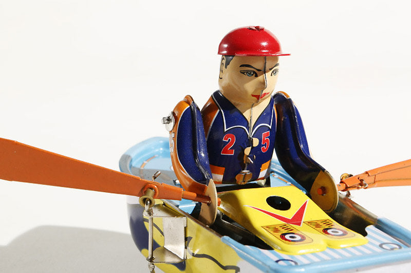 Close up of Rowing Boat tin toy