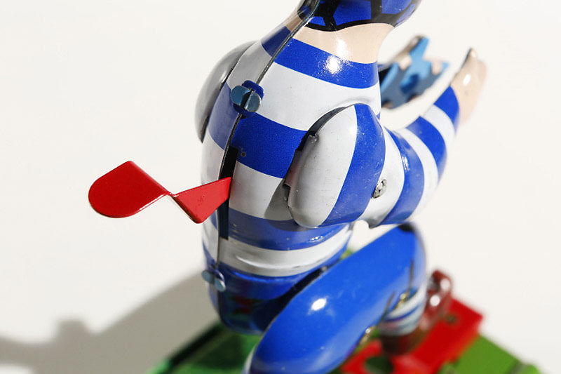 Close up of Rugby Player tin toy lever