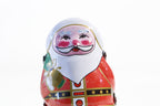 Close up of Tin Santa tin toy