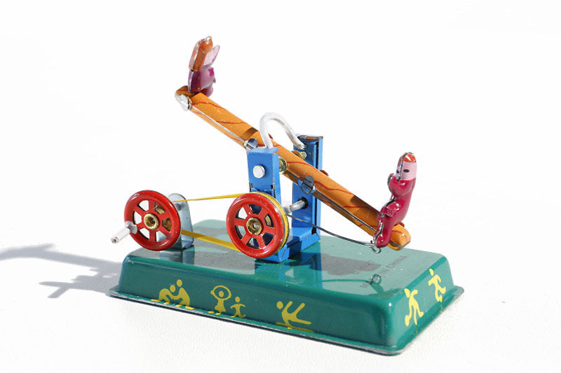 Seesaw tin toy