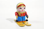 Small Girl on Ski's tin toy