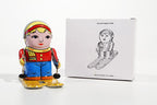 Small Girl on Ski's tin toy with packaging