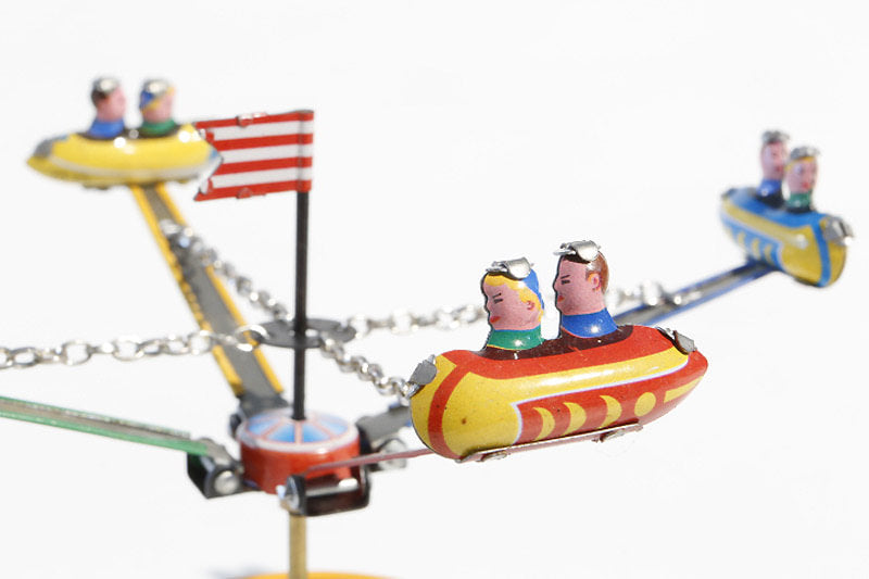 Small Rocket carousel tin toy