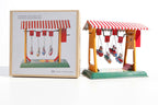 Small swing boats fairground tin toy with packaging
