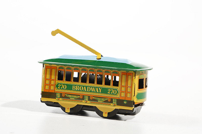 Small tram tin toy - yellow and green