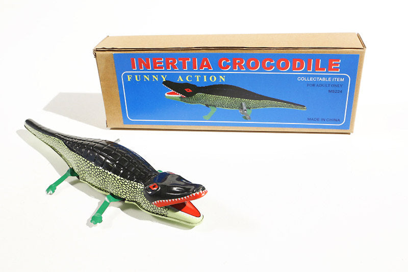 Tin Toy snapping crocodile with its packaging