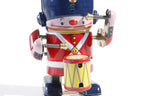 Close up of Small drumming soldier boy tin toy